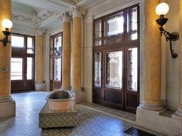 Lobby of the spa with one of its bathtubs on display.